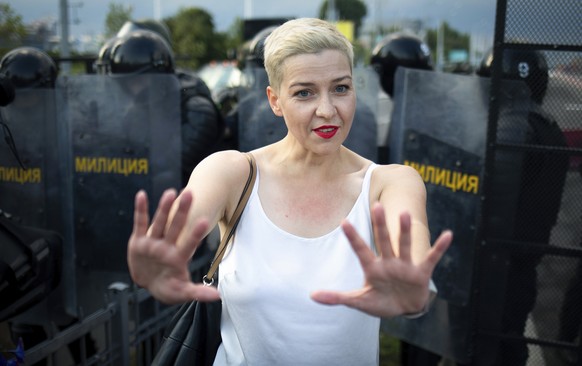 Maria Kolesnikova, one of Belarus&#039; opposition leaders, center, gestures during a rally in Minsk, Belarus, Sunday, Aug. 30, 2020. Tens of thousands of demonstrators have gathered in the capital of ...