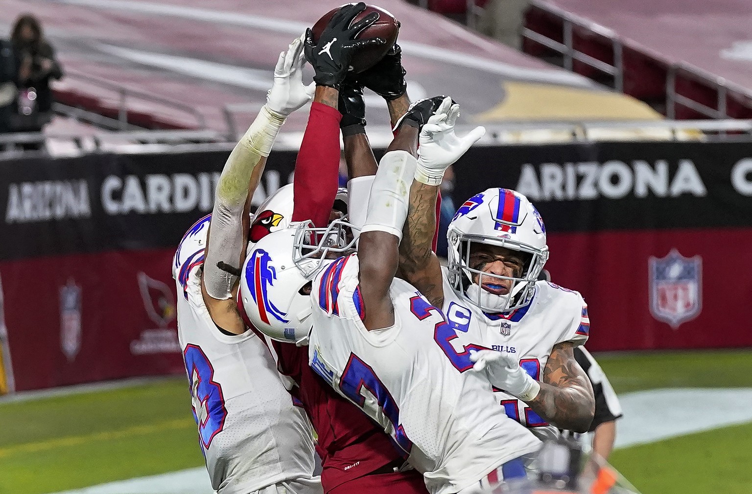 Arizona Cardinals wide receiver DeAndre Hopkins catches the game-winning touchdown as Buffalo Bills cornerback Tre&#039;Davious White, center, free safety Jordan Poyer, right, and strong safety Micah  ...
