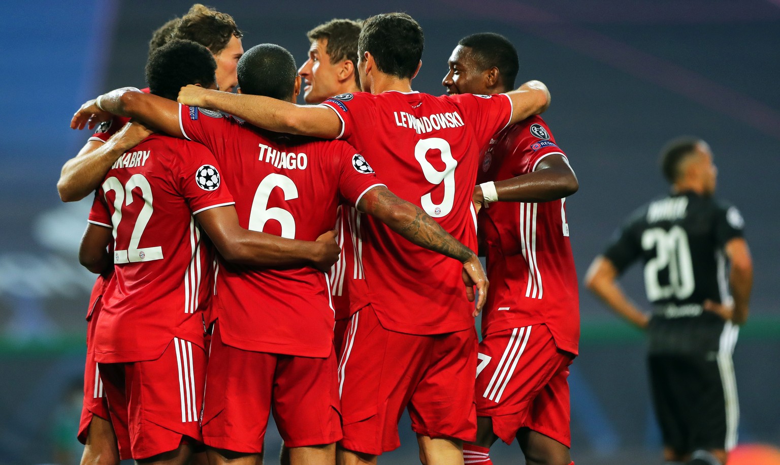 epa08613348 Players of Bayern Munich celebrate their 2-0 lead during the UEFA Champions League semi final soccer match between Olympique Lyon and Bayern Munich in Lisbon, Portugal, 19 August 2020. EPA ...