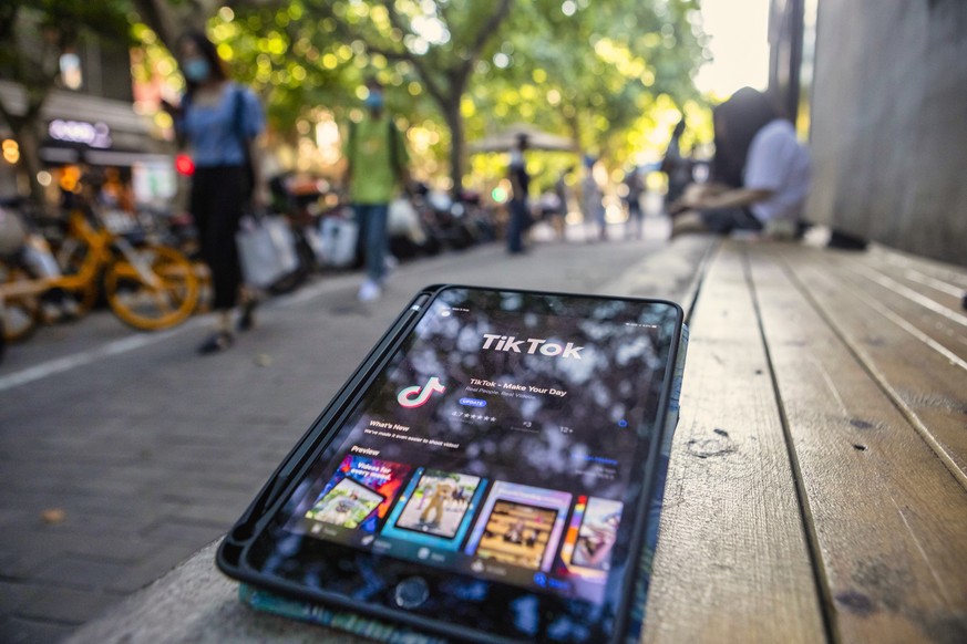 epa08581689 A TikTok app is seen on the tablet in Shanghai, China, 03 August 2020. According to media reports, Microsoft is in talks to buy the US operations of Chinese-owned short-video app TikTok wh ...