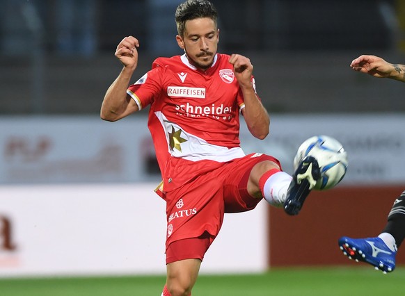 Lugano&#039;s player Alexander Gerndt, right, fights for the ball with Thun&#039;s player Miguel Castroman left during the Super League soccer match FC Lugano against FC Thun, at the Cornaredo stadium ...