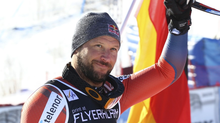 FILE - In this Saturday, March 10, 2018 file photo, Norway&#039;s Aksel Lund Svindal celebrates after taking third place in an alpine ski, men&#039;s World Cup downhill, in Kvitfjell, Norway. Aksel Lu ...