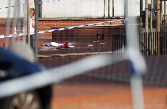 View of the site where a machete-wielding man injured two female police officers before being shot outside the main police station in Charleroi, Belgium, August 6, 2016. REUTERS/Francois Lenoir