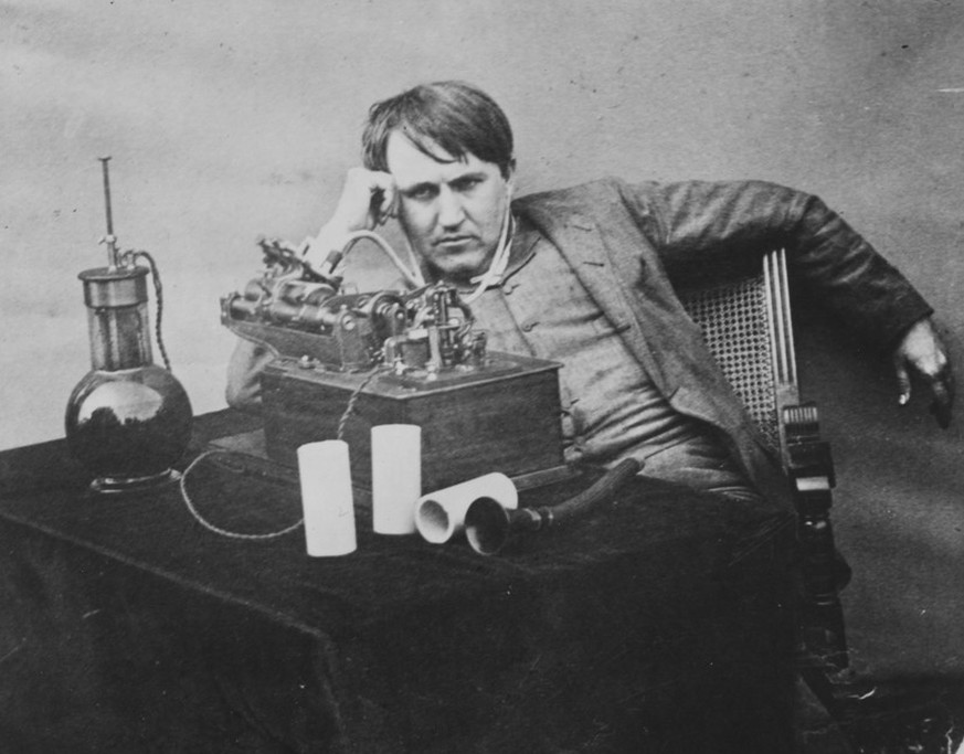 This 1888 photo provided by the Museum of Innovation and Science in Schenectady, N.Y., shows Thomas Edison listening to a wax cylinder phonograph. Researchers have digitized what experts say is the ol ...