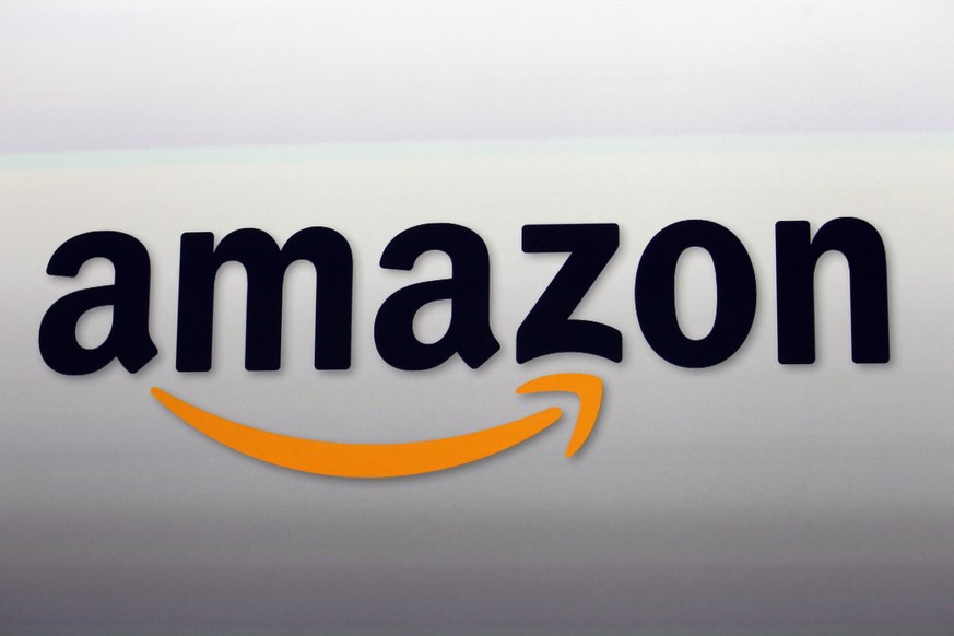 FILE - In this Sept. 6, 2012, file photo is the Amazon logo in Santa Monica, Calif. State officials in California and Washington are reviewing Amazon&#039;s business practices to determine whether the ...