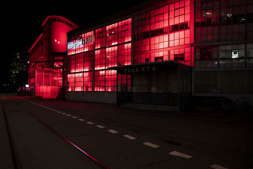 Maag Music Hall is pictured lit up in red during the action &quot;Night of light&quot; campaign, in Zurich, Switzerland, June 22, 2020. In the night from 22.06. to 23.06.2020, numerous companies from  ...