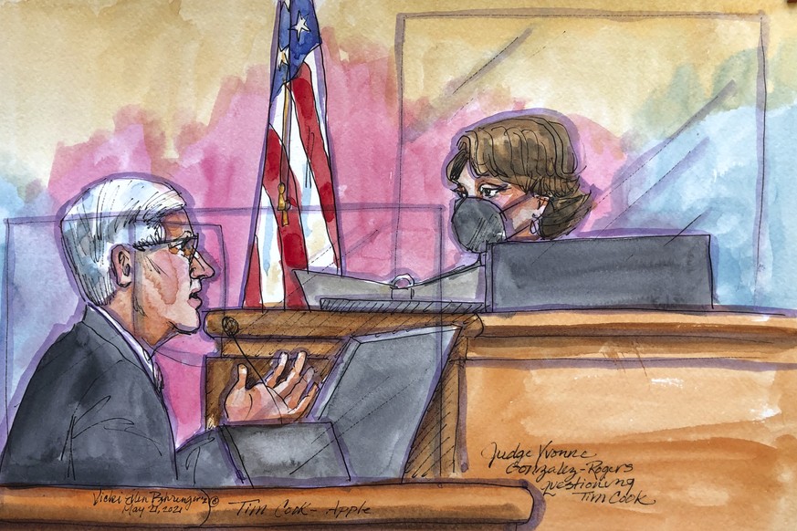 This courtroom sketch shows Apple CEO Tim Cook being questioned by U.S. District Court Judge Yvonne Gonzalez Rogers during a trial in San Ramon, Calif., on Friday, May 21, 2021. Cook described the com ...