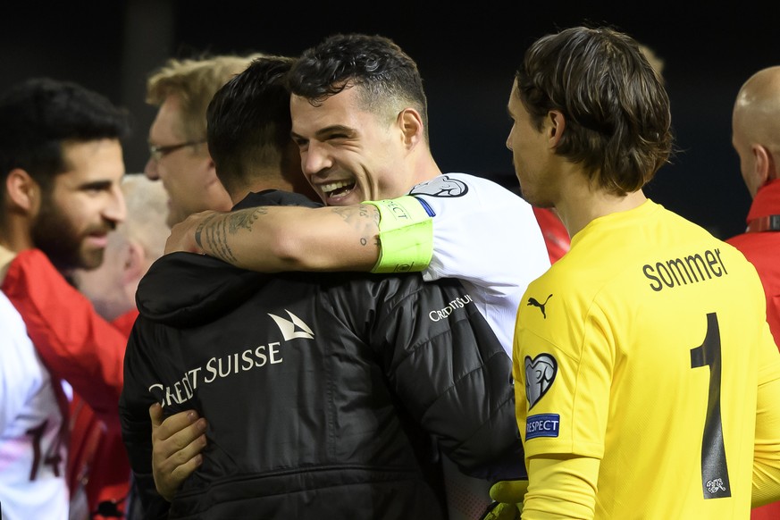 Switzerland&#039;s forward Granit Xhaka, center, celebrates after winning the game (6-1) with teammates, during the UEFA Euro 2020 qualifying Group D soccer match between Gibraltar and Switzerland, at ...