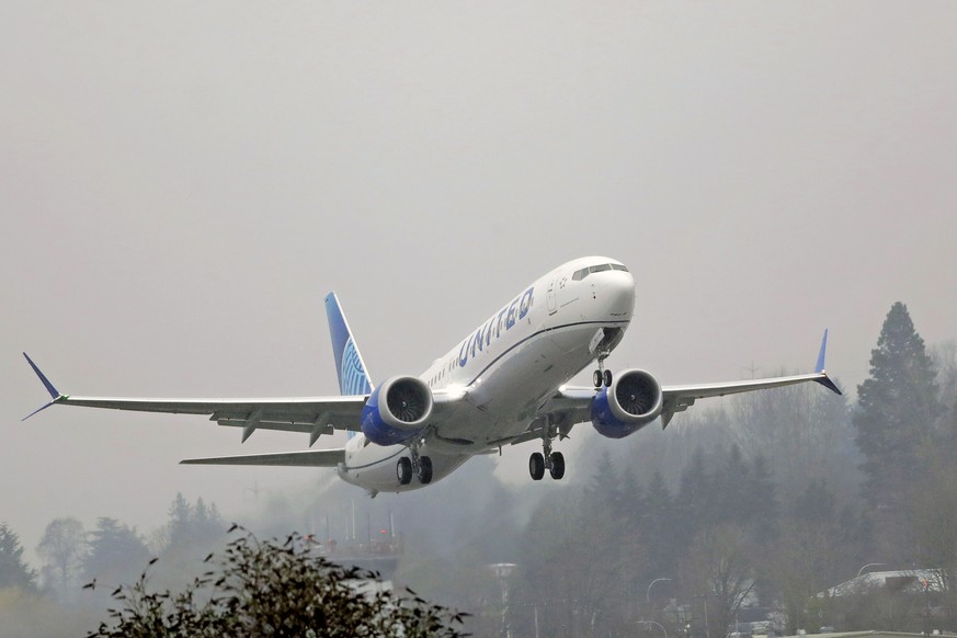 A United Airlines Boeing 737 Max airplane takes off in the rain, Wednesday, Dec. 11, 2019, at Renton Municipal Airport in Renton, Wash. After the first crash of a Boeing 737 Max in 2018, federal safet ...