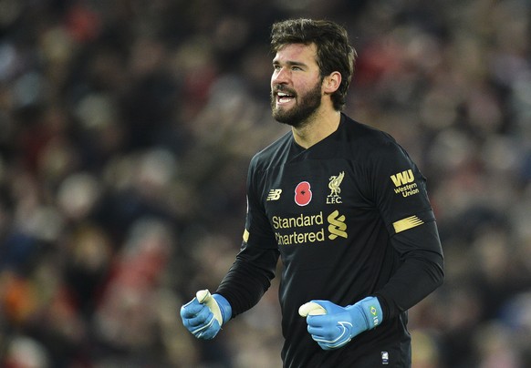 epa07986498 Liverpool&#039;s goalkeeper Alisson Becker reacts during the English Premier League soccer match between Liverpool FC and Manchester City in Liverpool, Britain, 10 November 2019. EPA/PETER ...