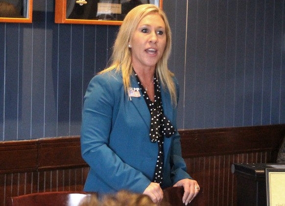 FILE - In this March 3, 2020, file photo, Republican Marjorie Taylor Greene speaks to a GOP women&#039;s group in Rome, Ga. The Democratic candidate running against Republican Marjorie Taylor Greene,  ...