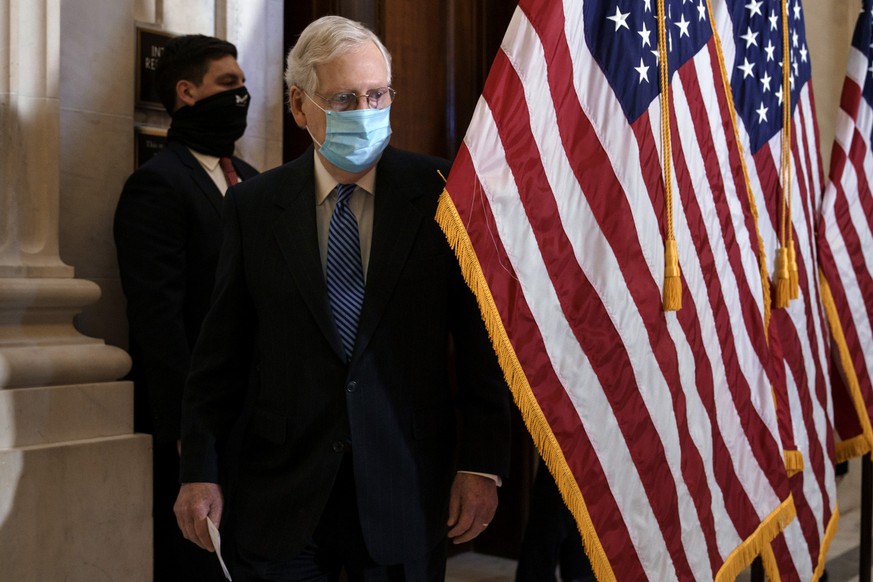 Senate Majority Leader Mitch McConnell, R-Ky., emerges from a closed-door meeting where the Republican Conference held leadership elections, on Capitol Hill in Washington, Tuesday, Nov. 10, 2020. McCo ...