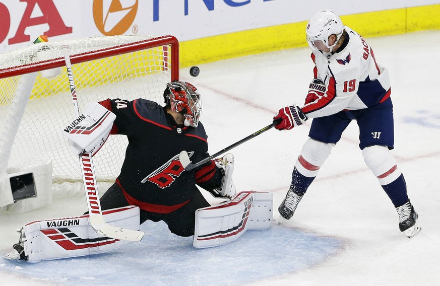 Carolina Hurricanes goalie Petr Mrazek, of the Czech Republic, blocks Washington Capitals&#039; Nicklas Backstrom (19), of Sweden, during the third period of Game 3 of an NHL hockey first-round playof ...