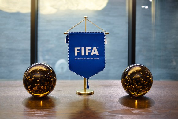 epa08334972 (FILE) - View of the FIFA logo displayed on a pennant at the FIFA headquarters in Zurich, Switzerland, 01 October 2016 (re-issued on 31 March 2020). The world governing body FIFA will set  ...
