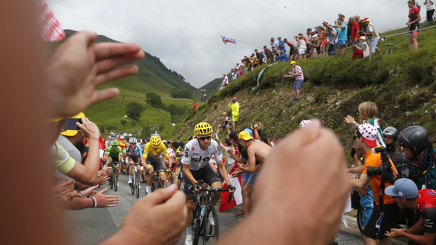 Spain&#039;s Mikel Nieve, Britain&#039;s Chris Froome, wearing the overall leader&#039;s yellow jersey, stage winner France&#039;s Romain Bardet, and Colombia&#039;s Rigoberto Uran, from front to rear ...