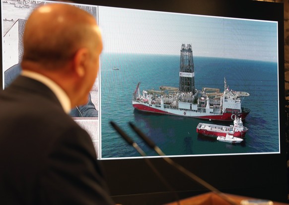 epa08616378 A handout photo made available by the Turkish President Press Office shows Turkish President Recep Tayyip Erdogan speaks during a press conference as he announces the biggest natural gas d ...