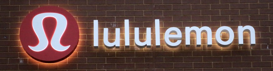 FILE- This June 5, 2017, file photo shows the Lululemon Athletica logo outside a store in Dedham, Mass. Lululemon Athletica Inc. reports earnings Thursday, Aug. 30, 2018. (AP Photo/Steven Senne, File)