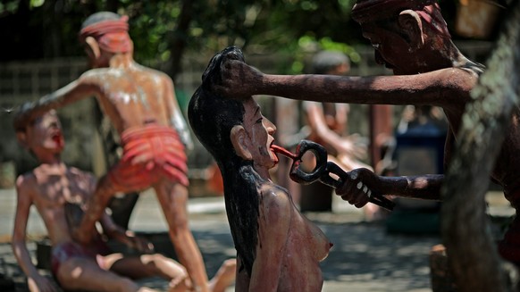 Folter-Figuren (in Thailand).
