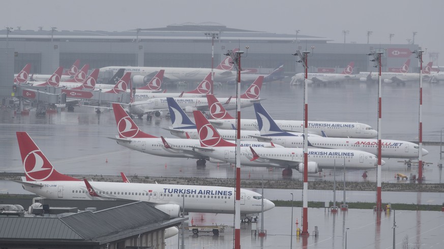 epa08329907 Turkish Airline planes sit on the tarmac at Istanbul International Airport, in Istanbul, Turkey, 29 March 2020. Turkish Health Minister Koca said on 28 March that there are 7,402 confirmed ...
