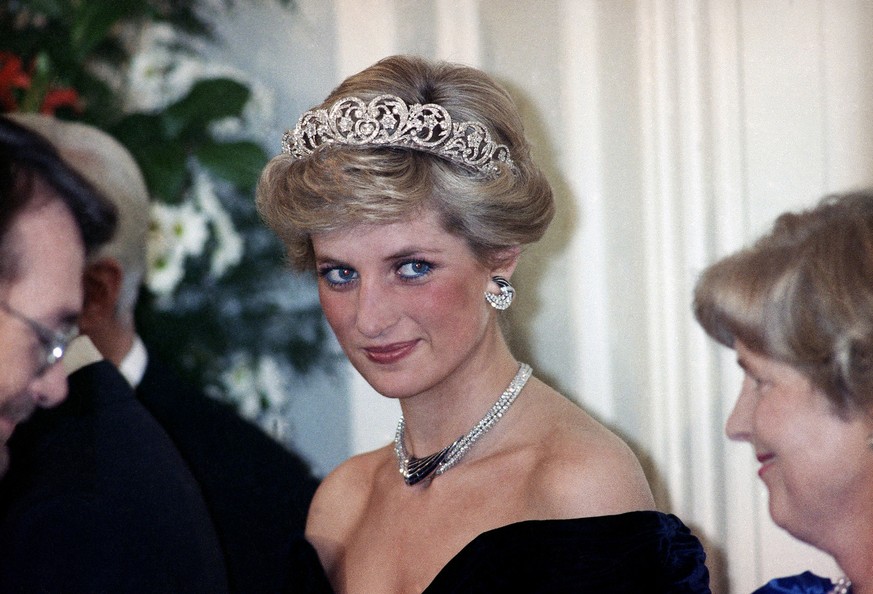 FILE - In this Monday, Nov. 2, 1987 file photo, Britain&#039;s Diana, the Princess of Wales, is pictured during an evening reception given by the West German President Richard von Weizsacker in honour ...