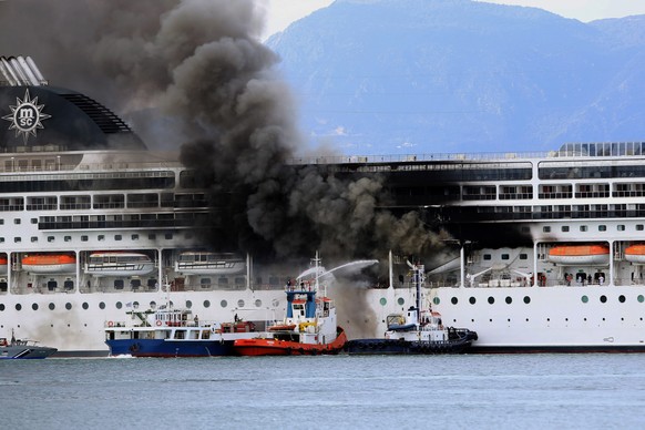 epa09069960 A fire broke out on the &#039;MSC Lirica&#039; cruiseship on 12 March 2021, while it was tied at the Corfu port, Ionian Sea, Greece, since January 30 for the winter season. Onboard were cr ...
