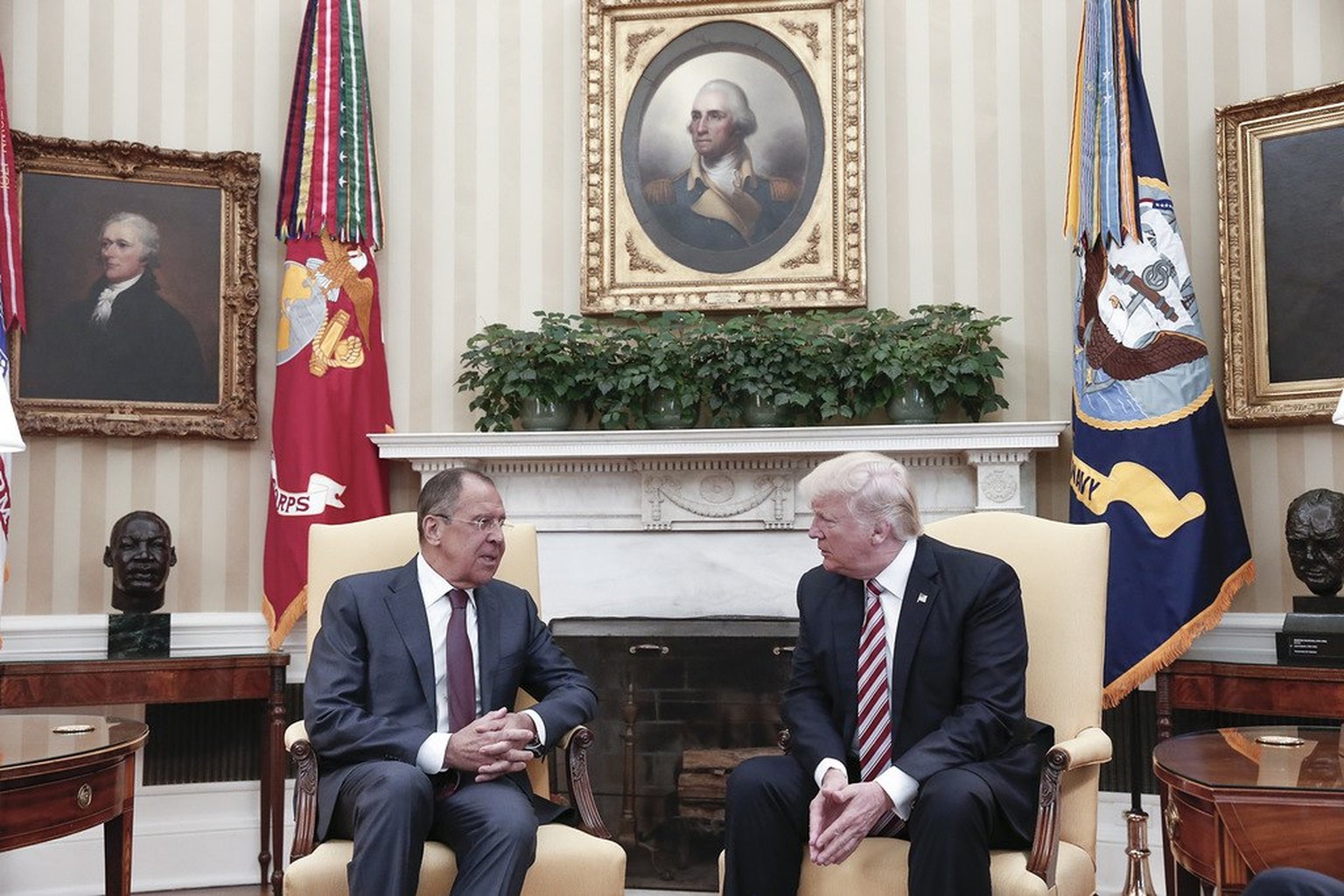 epa05955474 A handout photo made available by the Russian Foreign Ministry shows US President Donald J. Trump (R) speaking with Russian Foreign Minister Sergei Lavrov (L) during their meeting in the W ...