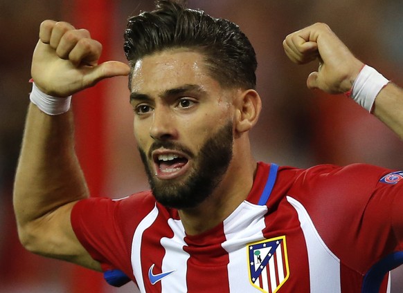 FILE - In this Wednesday, Sept. 28, 2016 file photo, Atletico&#039;s Yannick Carrasco celebrates scoring the opening goal during the Champions League group D soccer match between Atletico Madrid and F ...