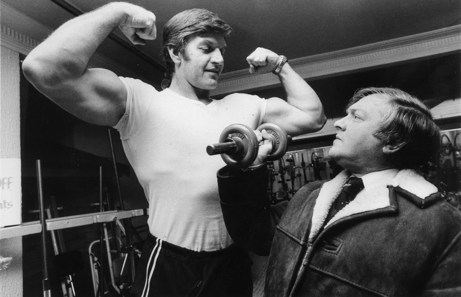 You Can Be Like Me!
13th January 1978: A potential client admires Dave Prowse who works in the keep-fit department of Harrods. He also plays the role of Darth Vader in Star Wars. (Photo by Colin Davey ...