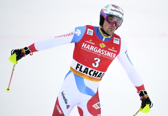 epa08943425 Daniel Yule of Switzerland reacts in the finish area during the second run of the Men&#039;s Slalom race at the FIS Alpine Skiing World Cup in Flachau, Austria, 17 January 2021. EPA/CHRIST ...