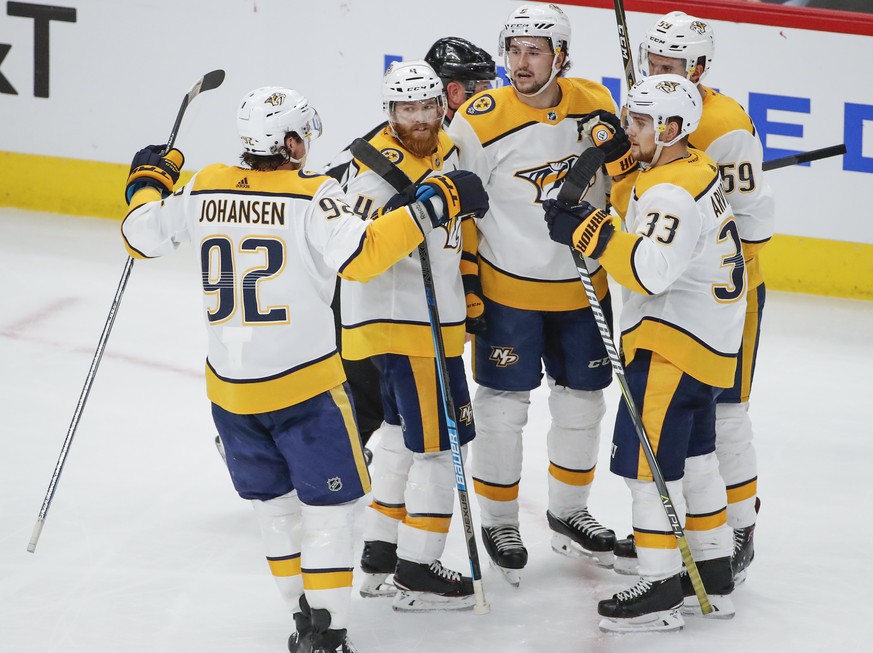Nashville Predators left wing Filip Forsberg (9) celebrates with teammates after scoring against the Chicago Blackhawks during the second period of an NHL hockey game Wednesday, Jan. 9, 2019, in Chica ...