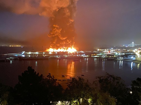 This photo courtesy of Dan Whaley, @dwhly, shows a warehouse fire burning at San Francisco&#039;s Fisherman&#039;s Wharf in San Francisco early Saturday, May 23, 2020. The fire tore through the wareho ...