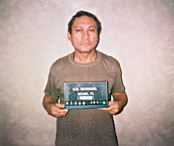 epa05998518 (FILE) - A handout made available by US Marshall taken on 04 January 1990 shows former Panamanian General Manuel Antonio Noriega on a jail of United States (reissued 30 May 2017). Accordin ...