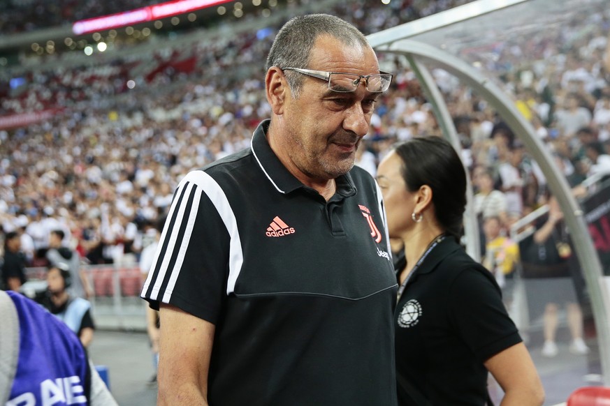 epa07731504 Juventus&#039; head coach Maurizio Sarri before the International Champions Cup (ICC) soccer match between Juventus FC and Tottenham Hotspur at the National Stadium in Singapore, 21 July 2 ...