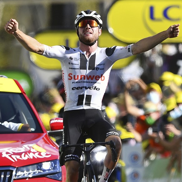 Switzerland&#039;s Marc Hirschi celebrates as he crosses the finish line to win the stage 12 of the Tour de France cycling race over 218 kilometers from Chauvigny to Sarran, Thursday, Sept. 10, 2020.  ...