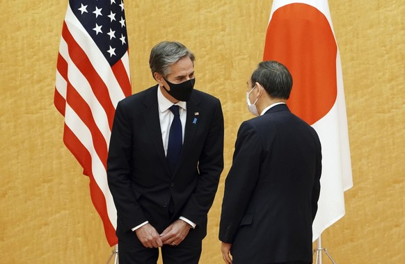 Japanese Prime Minister Yoshihide Suga, right, meets with U.S. Secretary of State Antony Blinken, left, during a courtesy call at the prime minister&#039;s official residence Tuesday, March 16, 2021.  ...