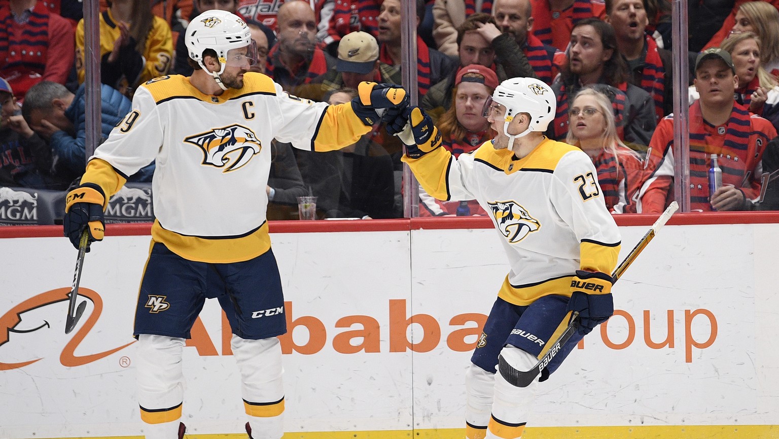 Nashville Predators right wing Rocco Grimaldi (23) celebrates his goal with defenseman Roman Josi (59) during the first period of the team&#039;s NHL hockey game against the Washington Capitals, Wedne ...