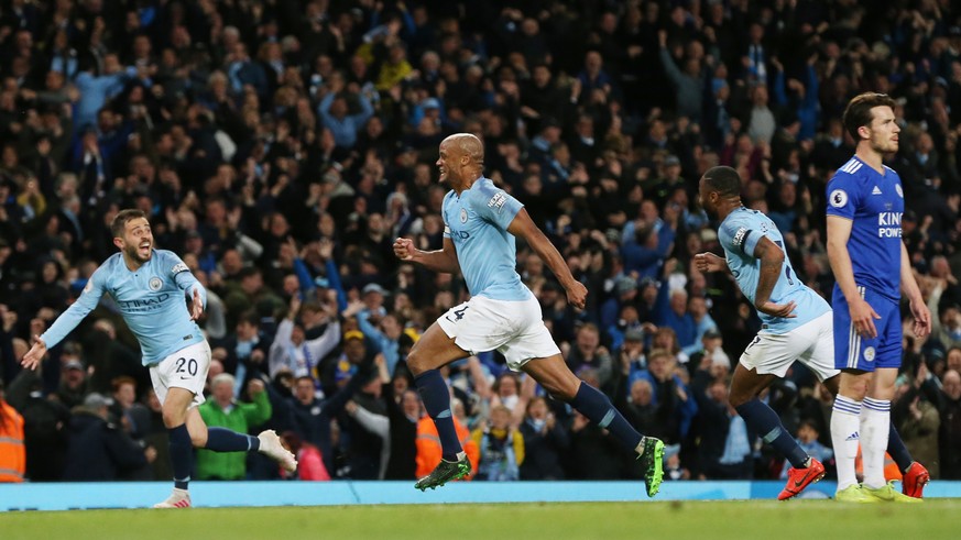 epa07551935 Manchester City&#039;s Vincent Kompany (C) celebrates scoring a goal during the English Premier League soccer match between Manchester City and Leicester City at the Etihad Stadium in Manc ...