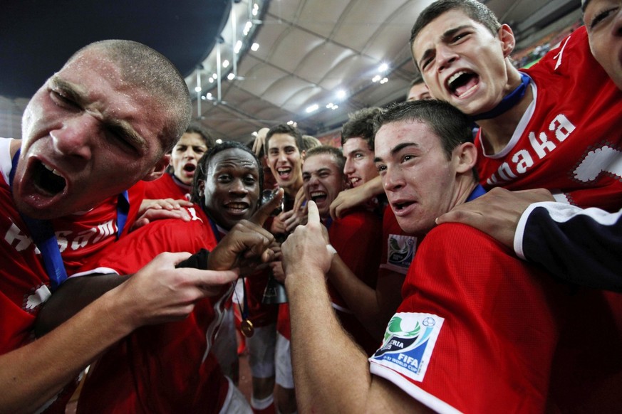 Switzerland&#039;s Soccer players react after beating Nigeria, after their U17 World Cup Final soccer match in Abuja, Nigeria Sunday, Nov. 15, 2009. (AP Photo/Sunday Alamba)