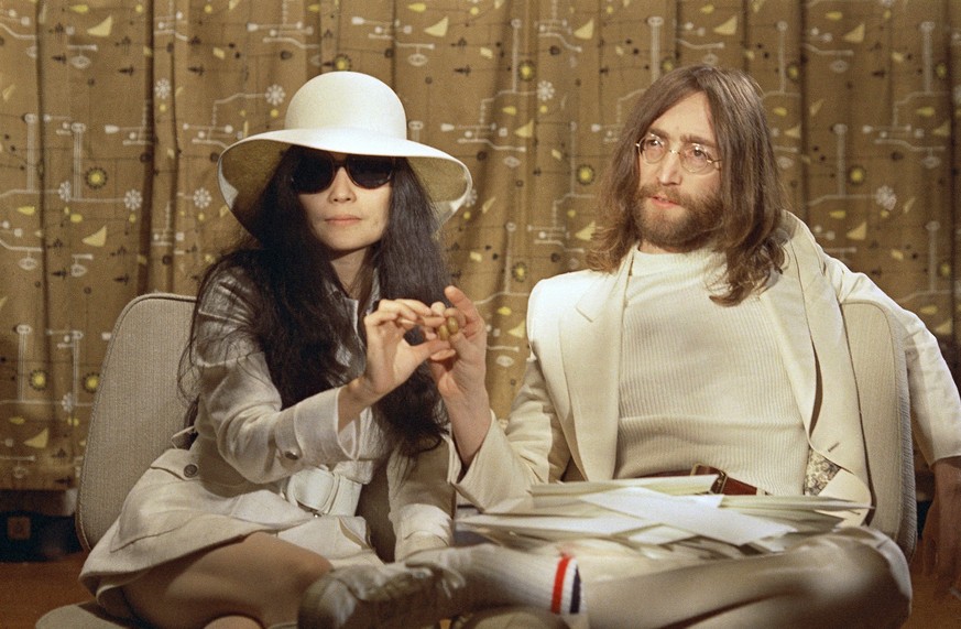 This 1969 photo shows musician John Lennon, right, and his wife Yoko Ono during a press conference. An album, &quot;Gimme Some Truth&quot; by John Lennon, will be released Friday, on what would have b ...