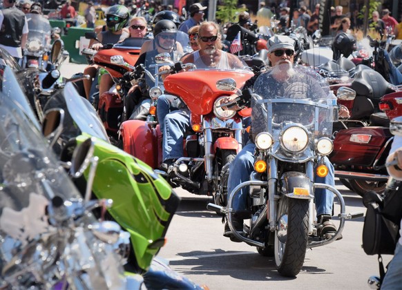 This Aug. 2, 2019 photo shows Heavy traffic on legendary Main Street in Sturgis, S.D., South Dakota, which has seen an uptick in coronavirus infections in recent weeks, is bracing to host hundreds of  ...
