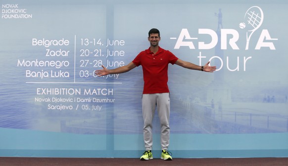 Serbian tennis player Novak Djokovic poses after the press conference in Belgrade, Serbia, Monday, May 25, 2020. Djokovic is planning to set up a series of tennis tournaments in the Balkan region whil ...