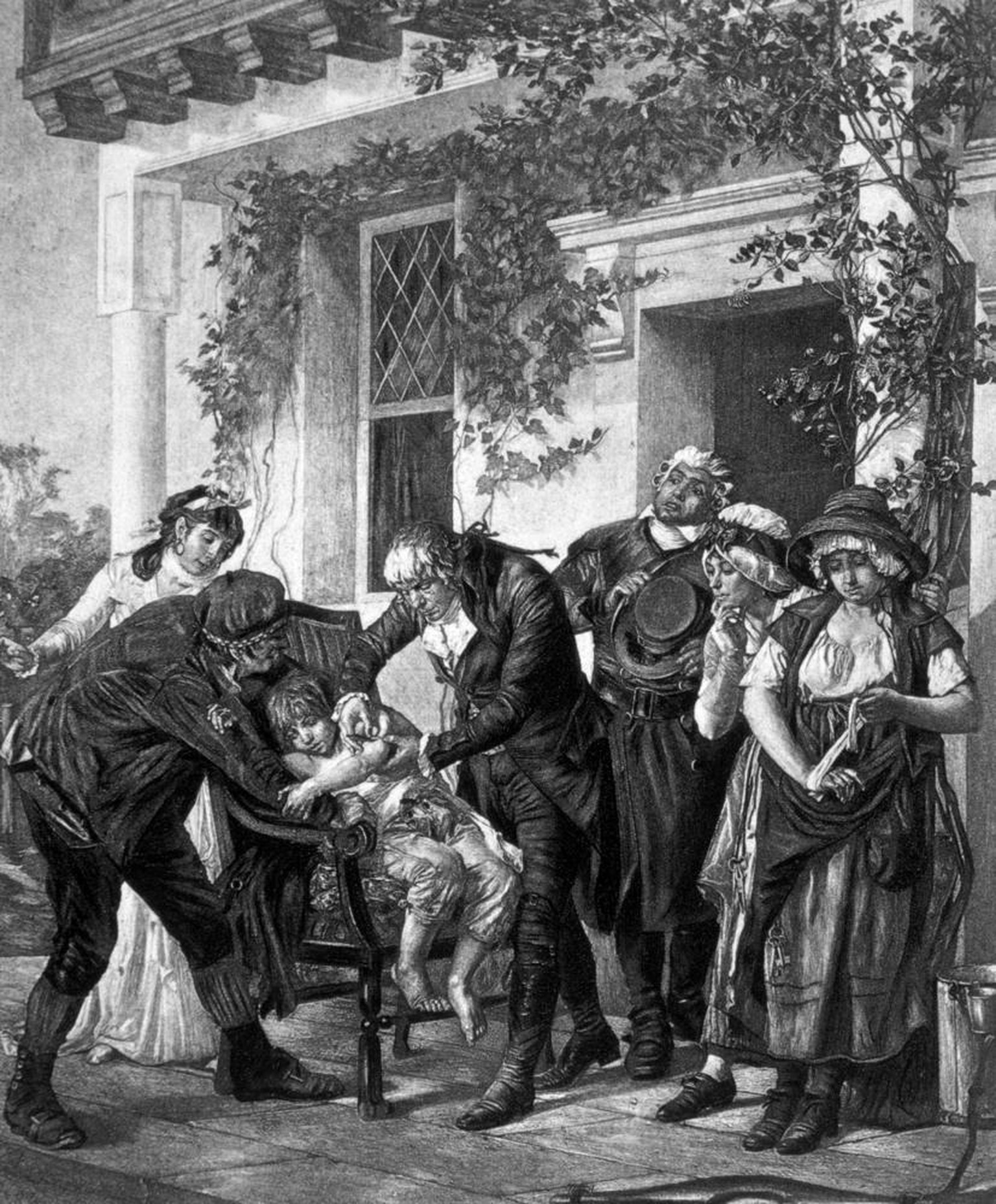 Der englische Arzt Edward Jenner impft einen 8-jährigen Jungen gegen Pocken, 1796.