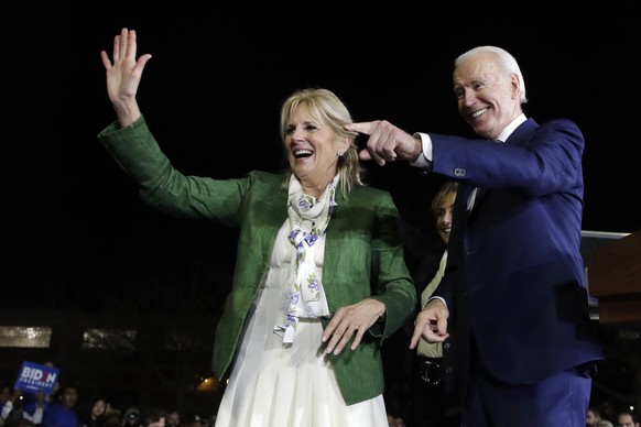 Democratic presidential candidate former Vice President Joe Biden, right, and his wife Jill attend a primary election night rally Tuesday, March 3, 2020, in Los Angeles. (AP Photo/Marcio Jose Sanchez) ...