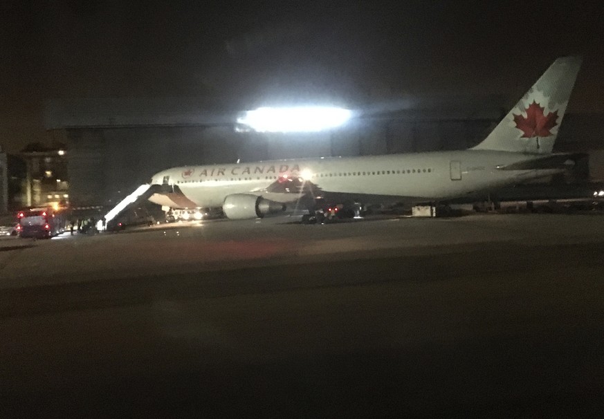 An Air Canada Boeing 767 aircraft is parked at Barajas international airport after making a safe emergency landing in Madrid, Spain, Monday Feb. 3, 2020. Toronto-bound flight AC837 had left from the S ...