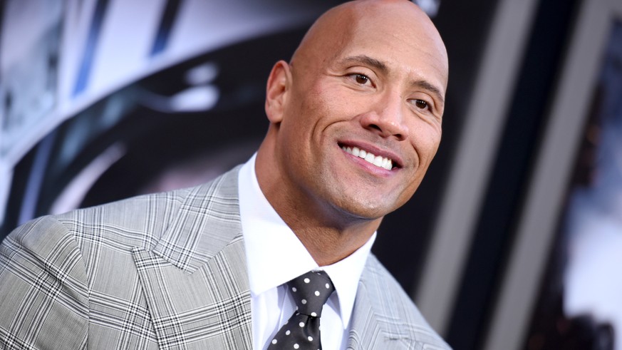 FILE - In this May 26, 2015 file photo, Dwayne Johnson arrives at the premiere of &quot;San Andreas&quot; at the TCL Chinese Theatre in Los Angeles. While speaking to TV critics Thursday, July 30, 201 ...