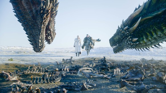 This image released by HBO shows Emilia Clarke, left, and Kit Harington in a scene from the final episode of &quot;Game of Thrones.&quot; The streaming service HBO Max will launch May 27, AT&amp;TÄôs ...