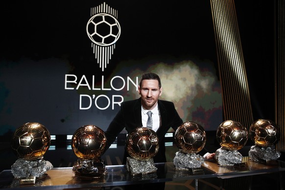 epa08040267 The Men&#039;s 2019 Ballon d&#039;Or winner Barcelona forward Lionel Messi poses with his six Ballon d&#039;Or trophies he won in his career so far during the ceremony at Theatre du Chatel ...
