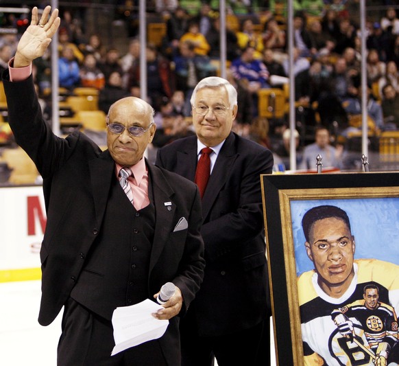 FILE - In this Jan. 19, 2008, file photo, former Boston Bruins hockey player Willie O&#039;Ree waves to the crowd in Boston after being honored on the 50th anniversary of breaking the color barrier in ...