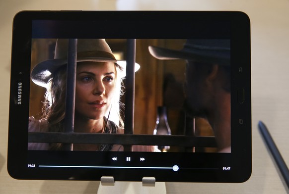 A Samsung Galaxy Tab S3 tablet displays it&#039;s colors as a movie plays on it, Tuesday, Feb. 21, 2017, during a company press briefing in New York. Samsung is shining the spotlight on it&#039;s new  ...
