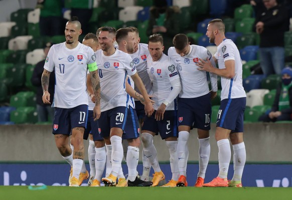 epa08816502 Slovakia&#039;s players celebrate after Juraj Kucka scores the 0-1 goal during the UEFA EURO 2020 play-off soccer match between Northern Ireland and Slovakia at Windsor Park stadium in Bel ...